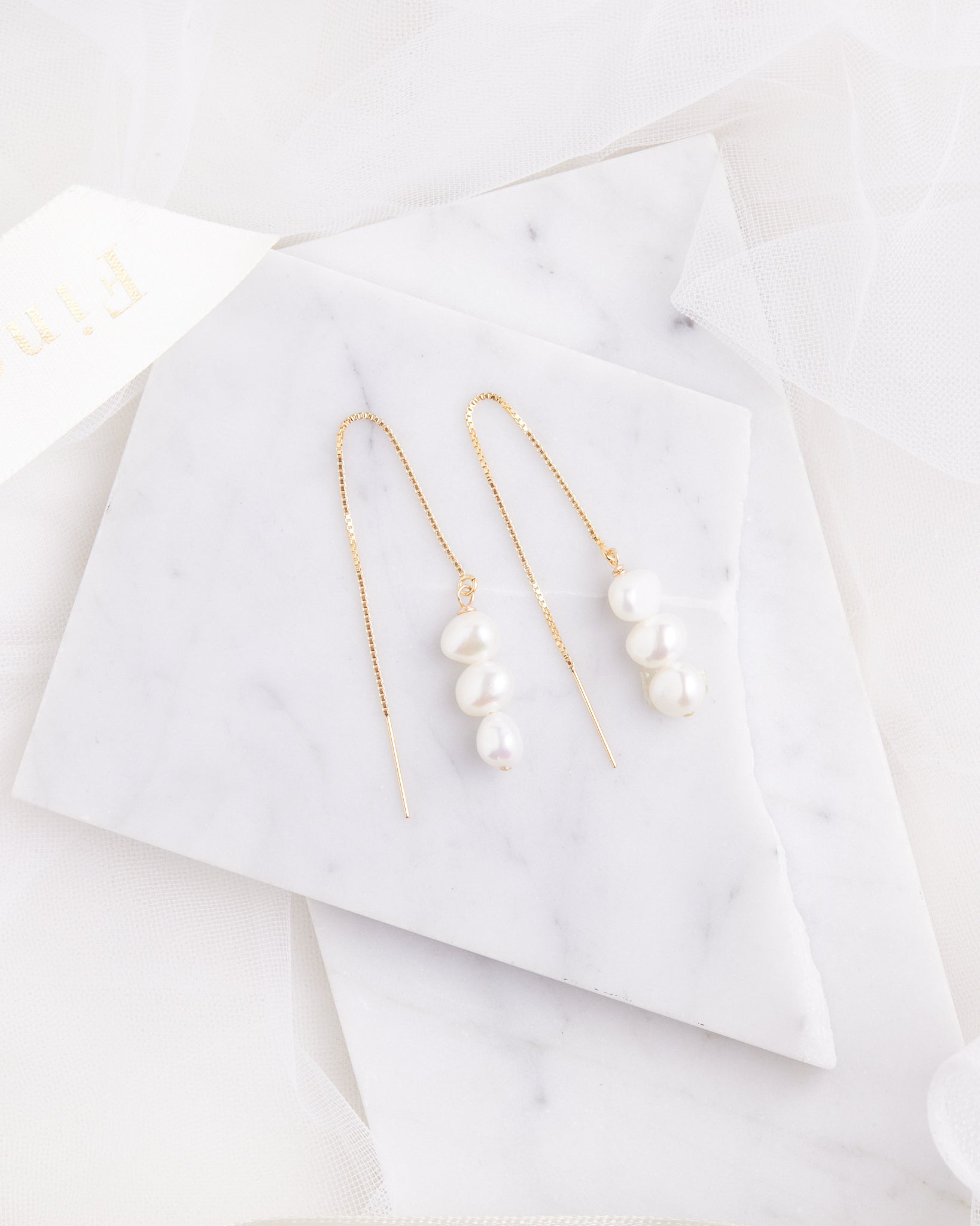 Pearl Ear Threads