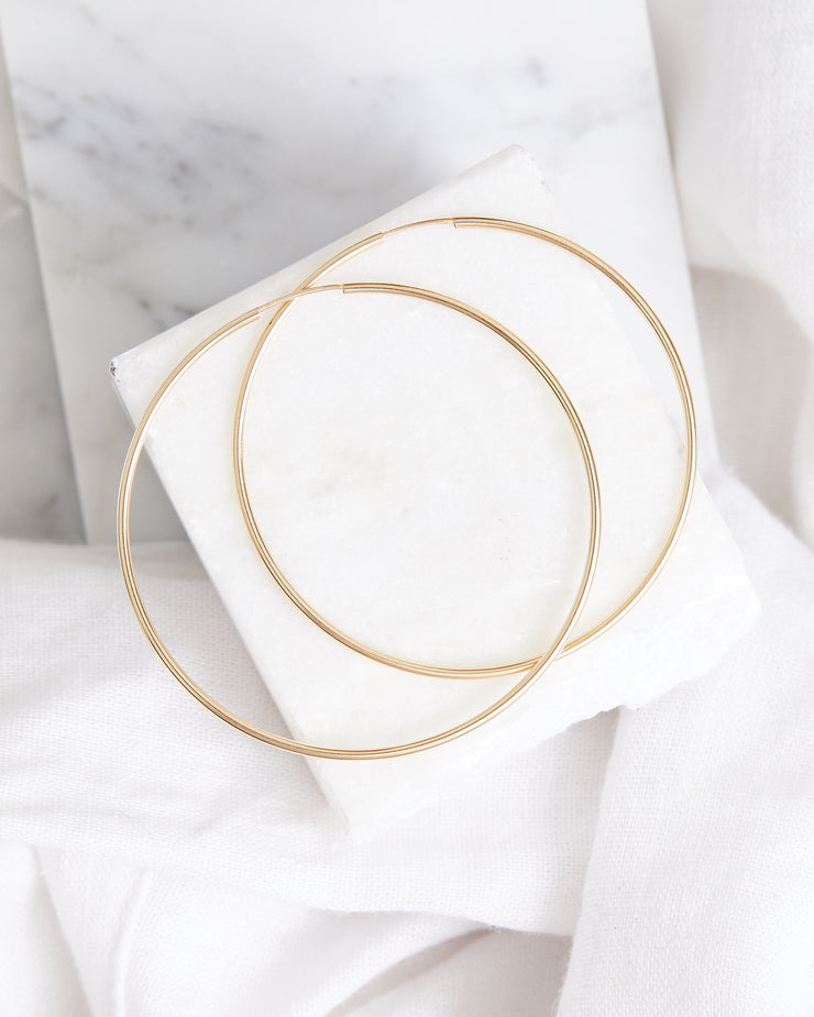 Solid gold large hoop earrings store