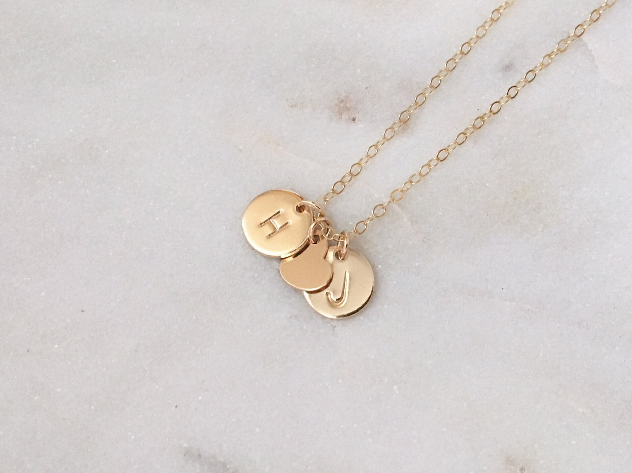 Two Initial Discs with heart 